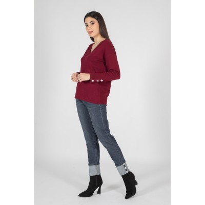 JEANS RISVOLTO BOTTONI...